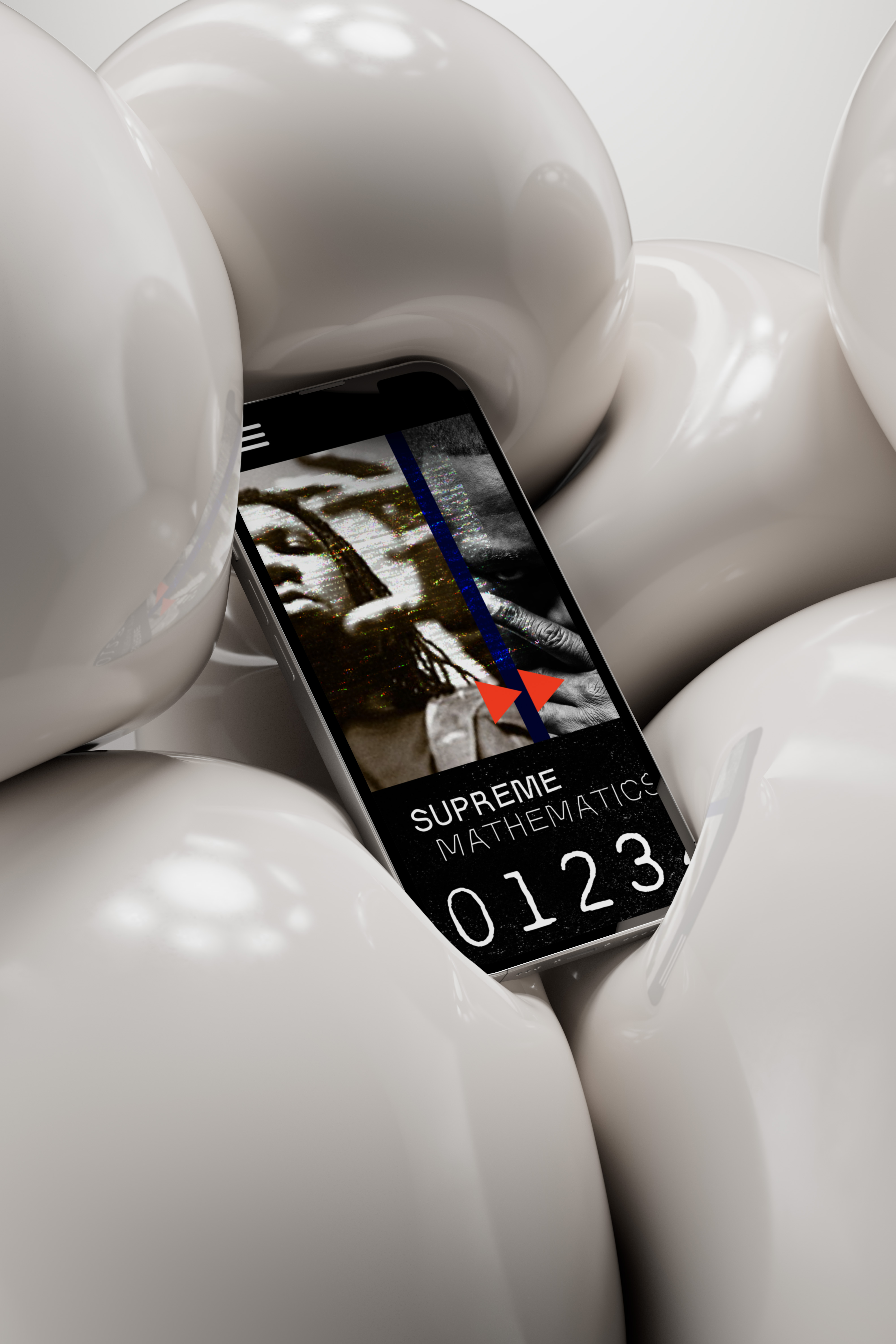 Smartphone laying on balloons.