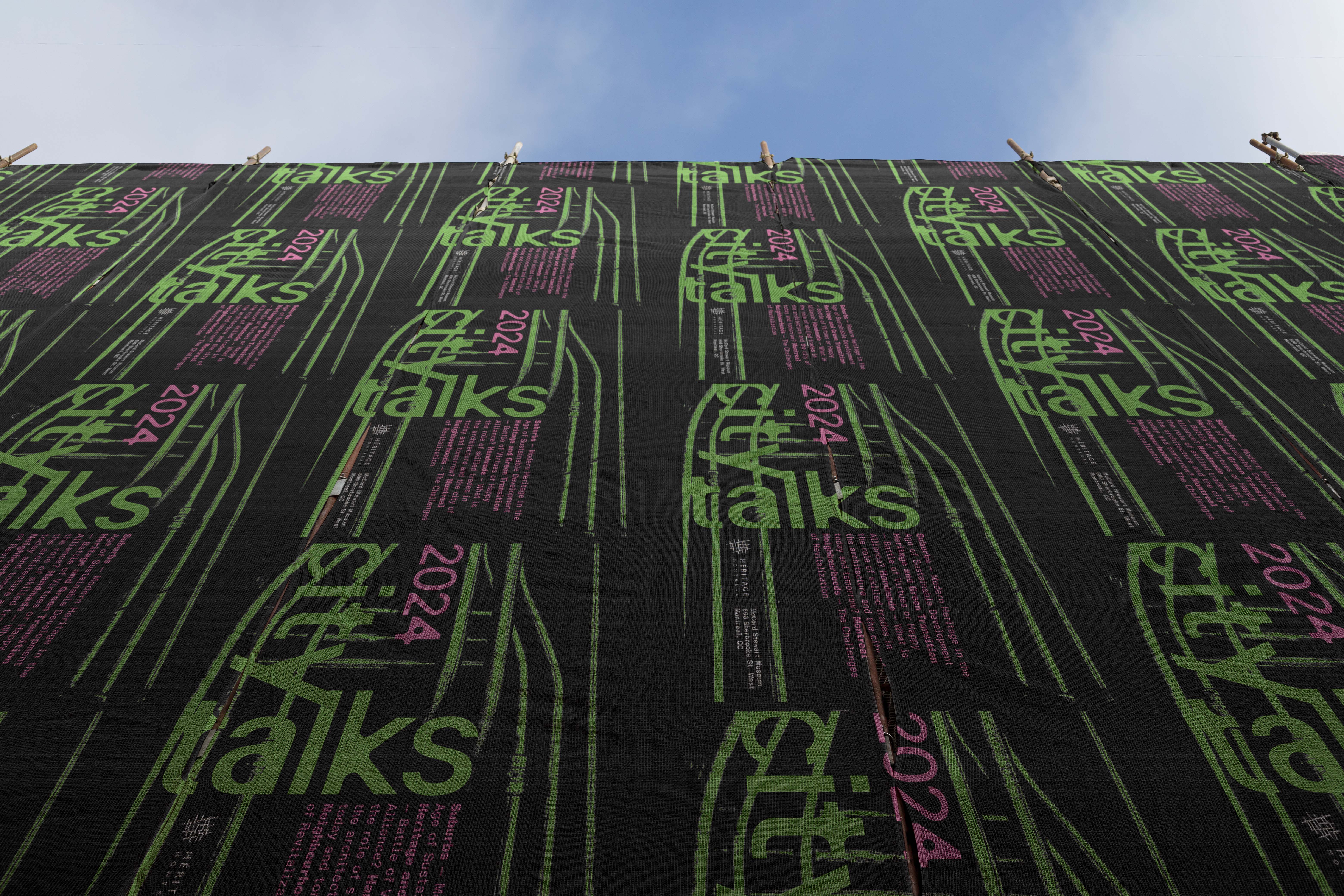 Canvas posters tiled over a wall.