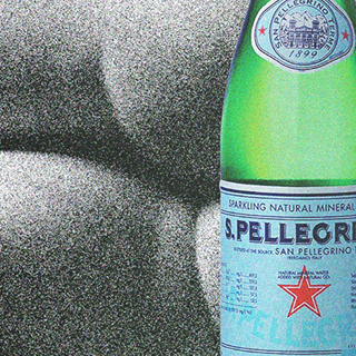 Close up of a San Pellegrino bottle covering a woman's bum.